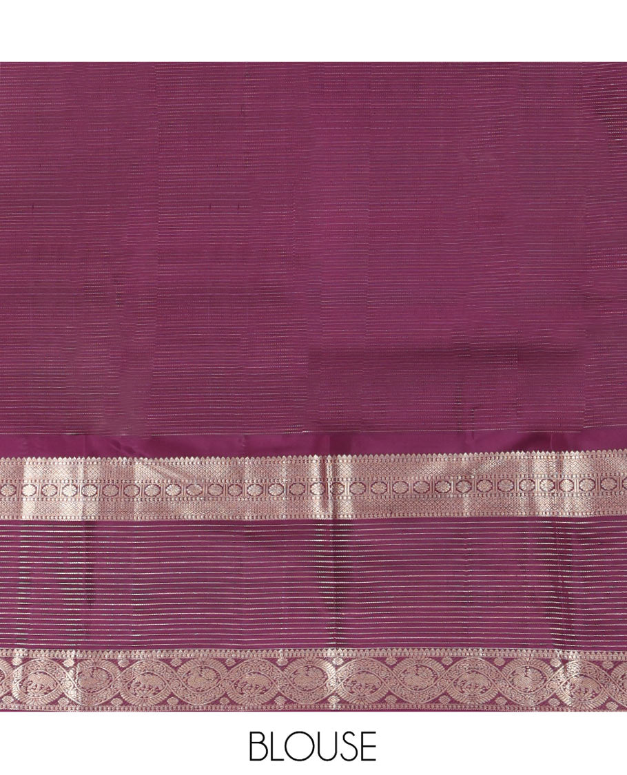Green Vasundhara Silk Saree Mesmerized with Zari Micro-Checks All Over Its Body, Complemented by a Contrast Border of Rekku, Kamalam, Mayil Kann, Yaanai and Mayil Designs, Subtly Sparkled Pallu of Jaal Designs, and Paired with a Contrast Blouse