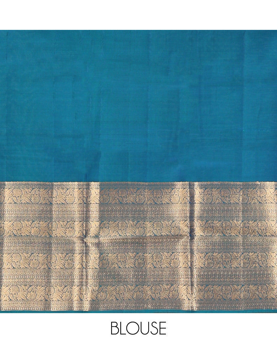 Scintillating Blue Vasundhara Lite-Silk Mix Saree, Gleamed Up with Zari on Its Body, Highlighted by Thazampoo Rekku Border of Neli, Paisa, Cross Kamalam, and Kodi Visiry Designs, a Grand Geometric-Patterned Pallu, and Paired with a Matching Blouse