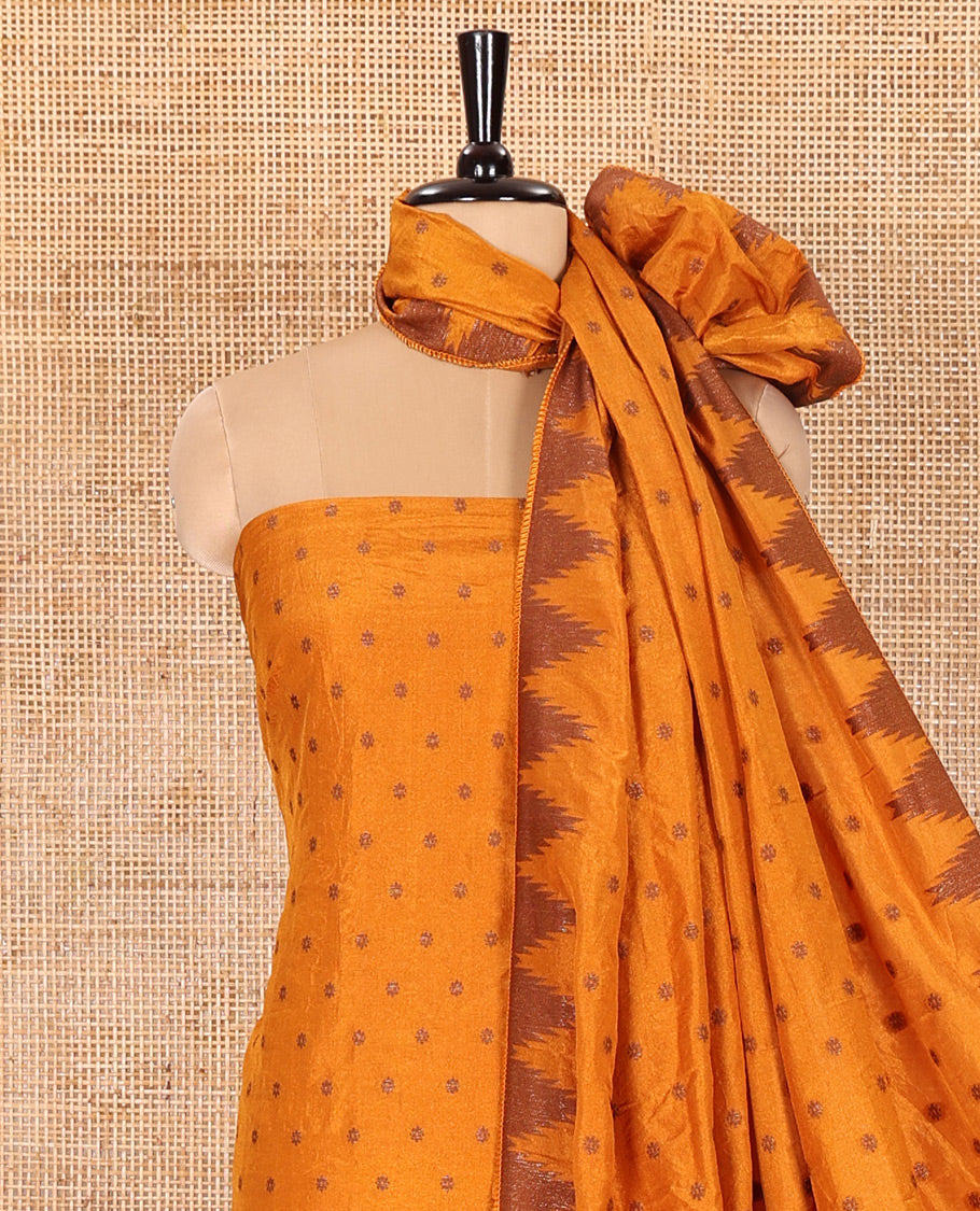 Yellow Material Chudidar Set Graced with 1000 Zari Buttas Woven Banaras Top, Subtly Made Plain Santoon Bottom, and a Banarasi Dupatta Featuring Zari Buttas and Temple Buttas