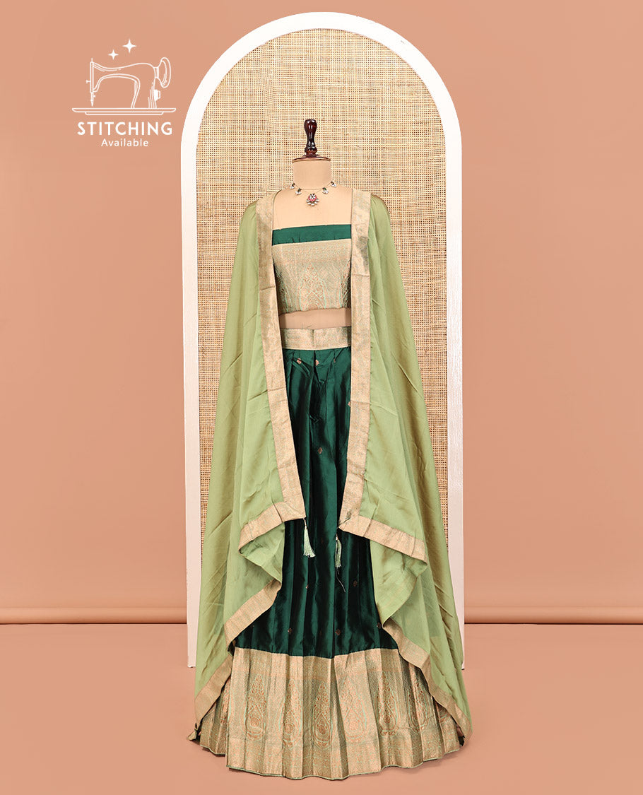 Green Art Silk Half Saree Features Buttas Skirt, Complemented by Contrast Traditional Border, Matching Blouse, and a Plain Zari-Bordered Dhavani