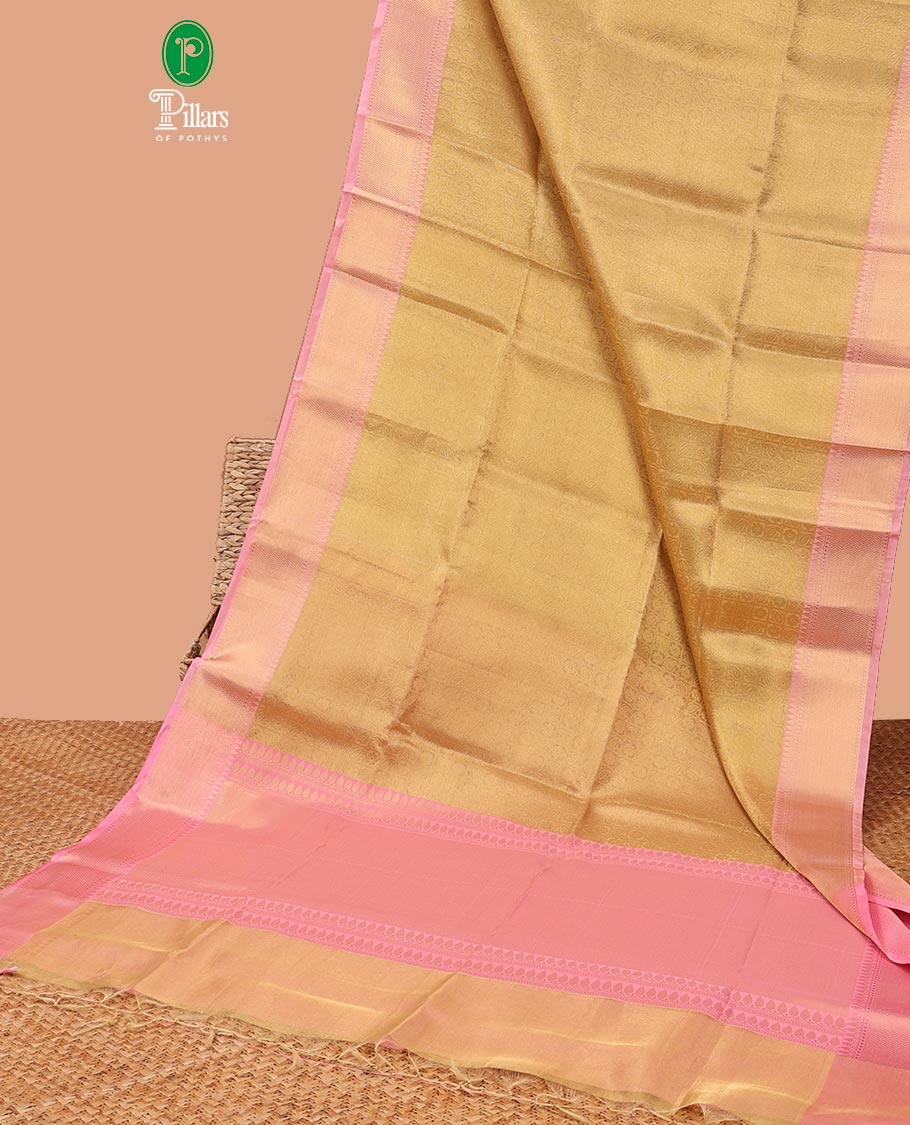 Gold color copper with pink zari tissue saree with light pink contrast border & pink copper brocade blouse