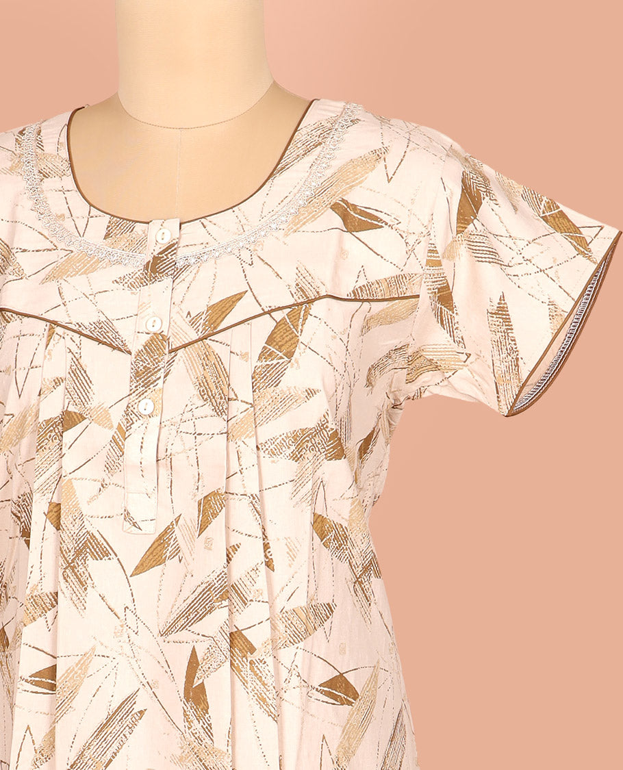 Light Sandal Cotton Nighty Adorned with Geometric Patterns Print, Featuring Neck Lace Work, Round Front Neck, and Half-Sleeves