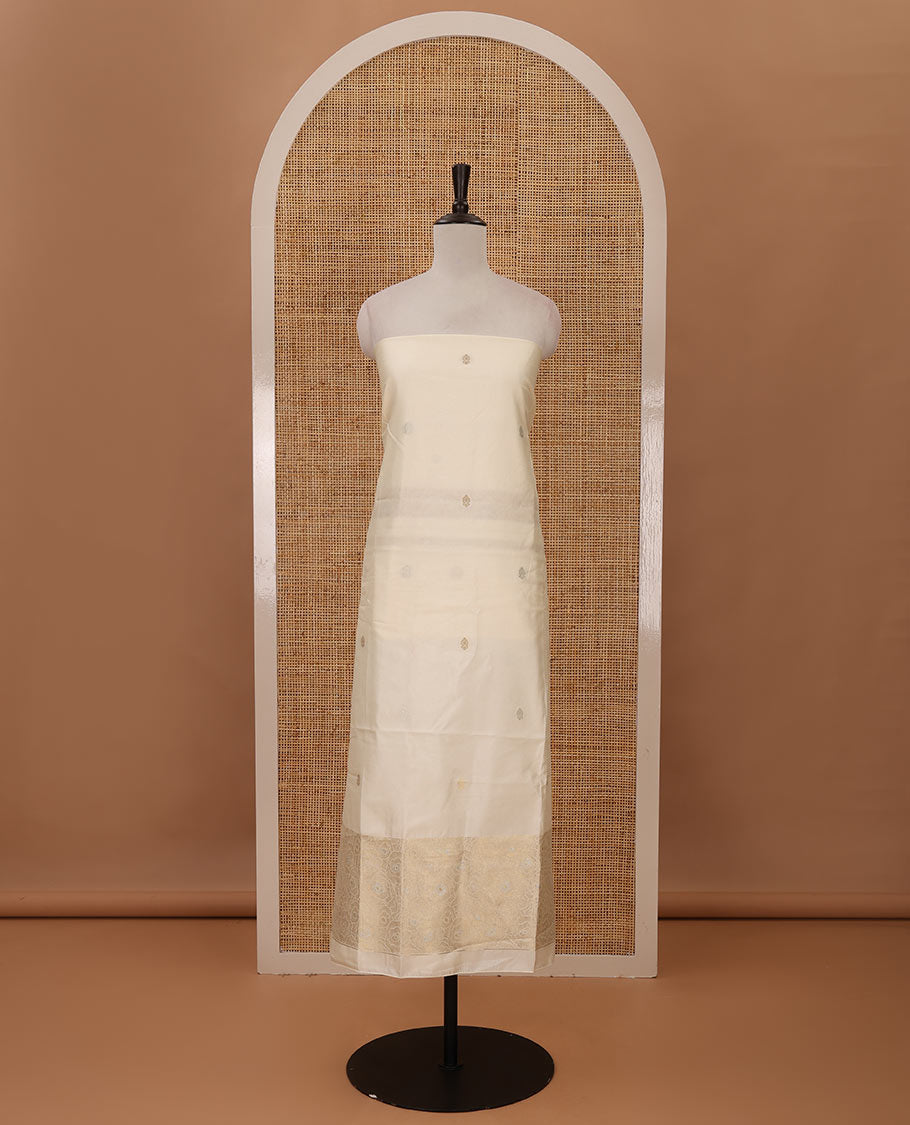 Kerala cream chudidar material, zari buttas & rose-like flowers woven taffeta silk top, plain santoon bottom & zari designs dupatta