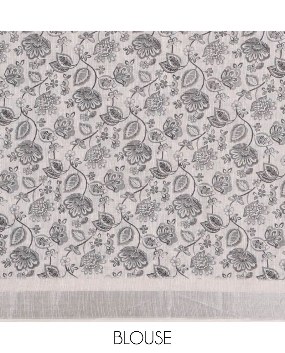 White unique-shaped floral printed linen cotton saree, silver zari border, floral printed pallu & intricate floral print blouse