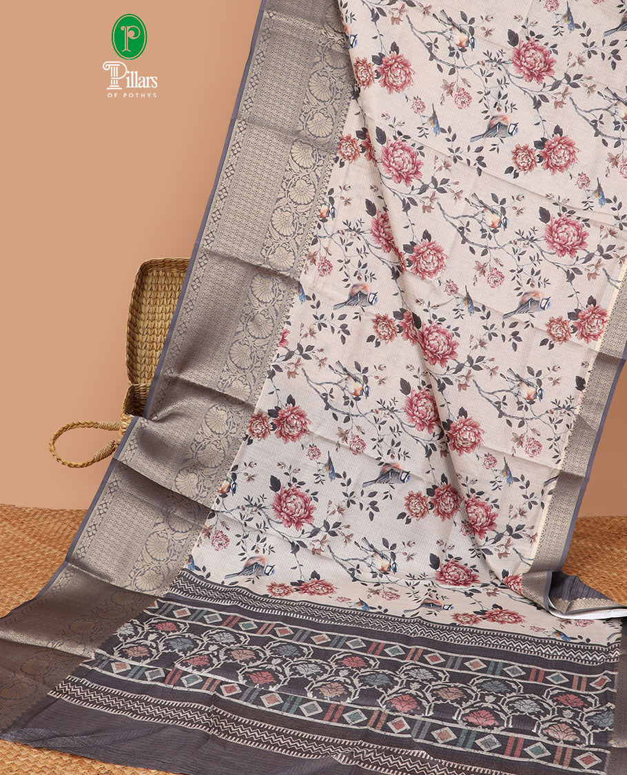 Cream with brown floral digital printed kota checks cotton saree with gold zari jacquard border & printed pallu along with contrast plain blouse