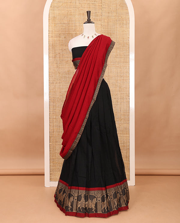 Black with red mercedised cotton half-saree, contrast elephant zari border skirt, matching blouse & one side border georgette dhavani
