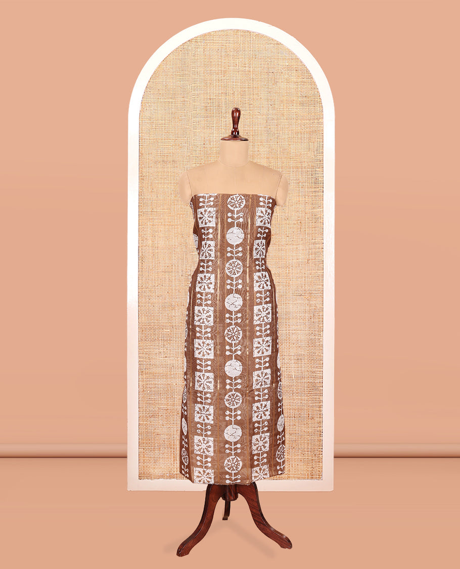 Brown Chanderi Material Chudidar Features Batik Printed Top, a Matching Bottom, and Batik Printed Dupatta