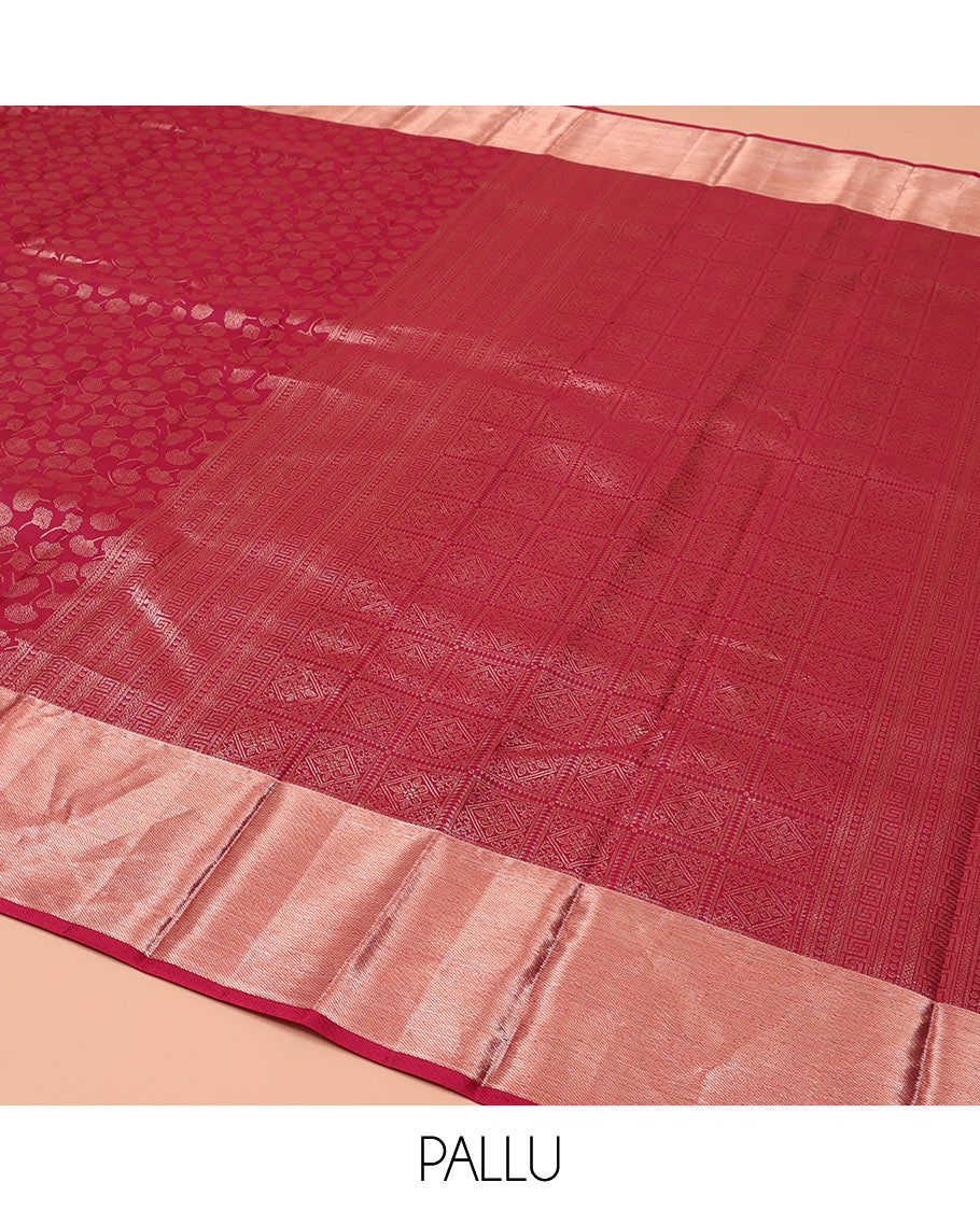 Wine Kanchipuram Wedding Silk Saree, Gleamed Up with Floral Buttas on Its Body, Highlighted by a Zari Border, Pallu of Geometric Designs, and Paired with a Matching Blouse
