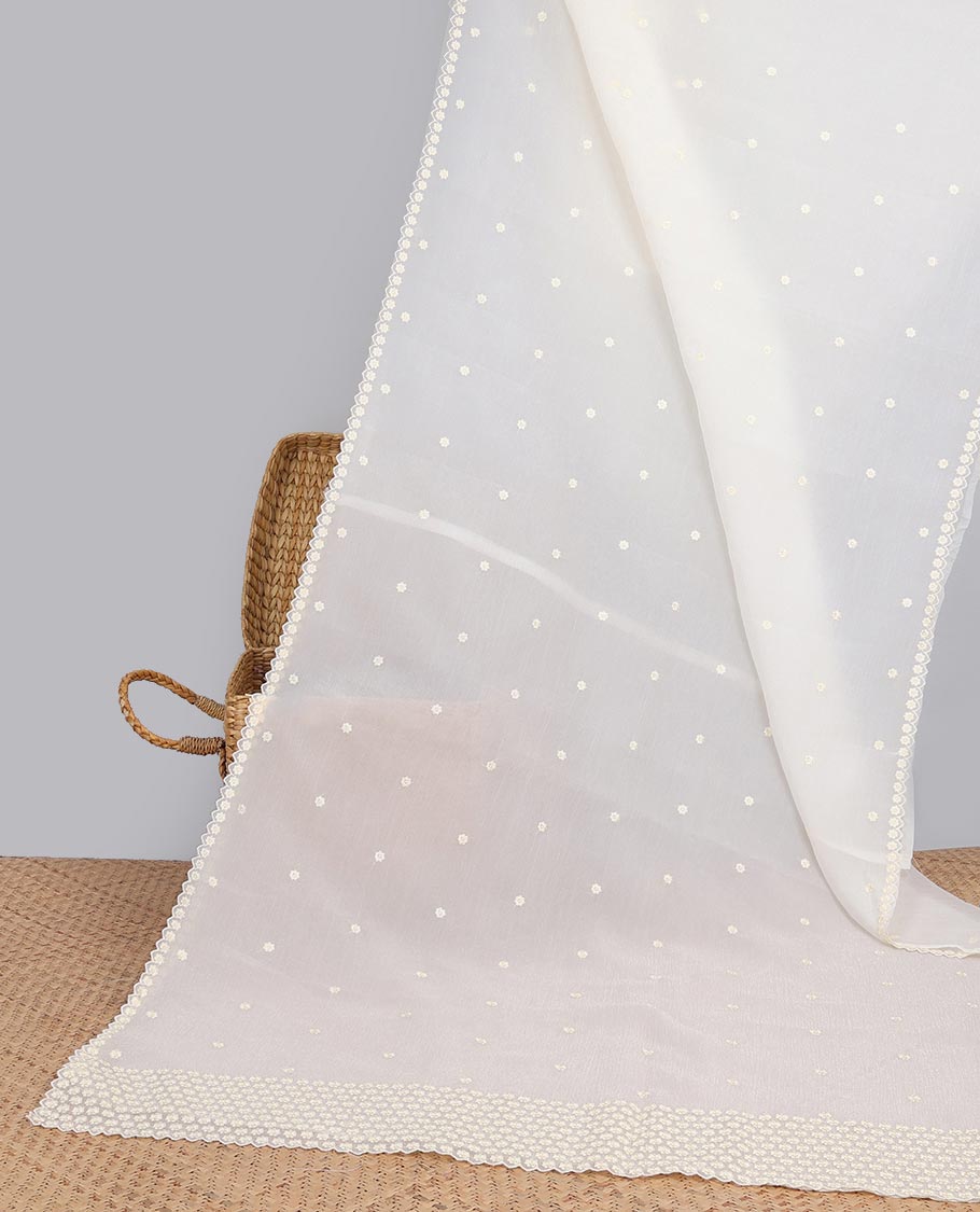 Pink Crushed Tissue saree with scallop motif border and intricate motif embroidery pallu