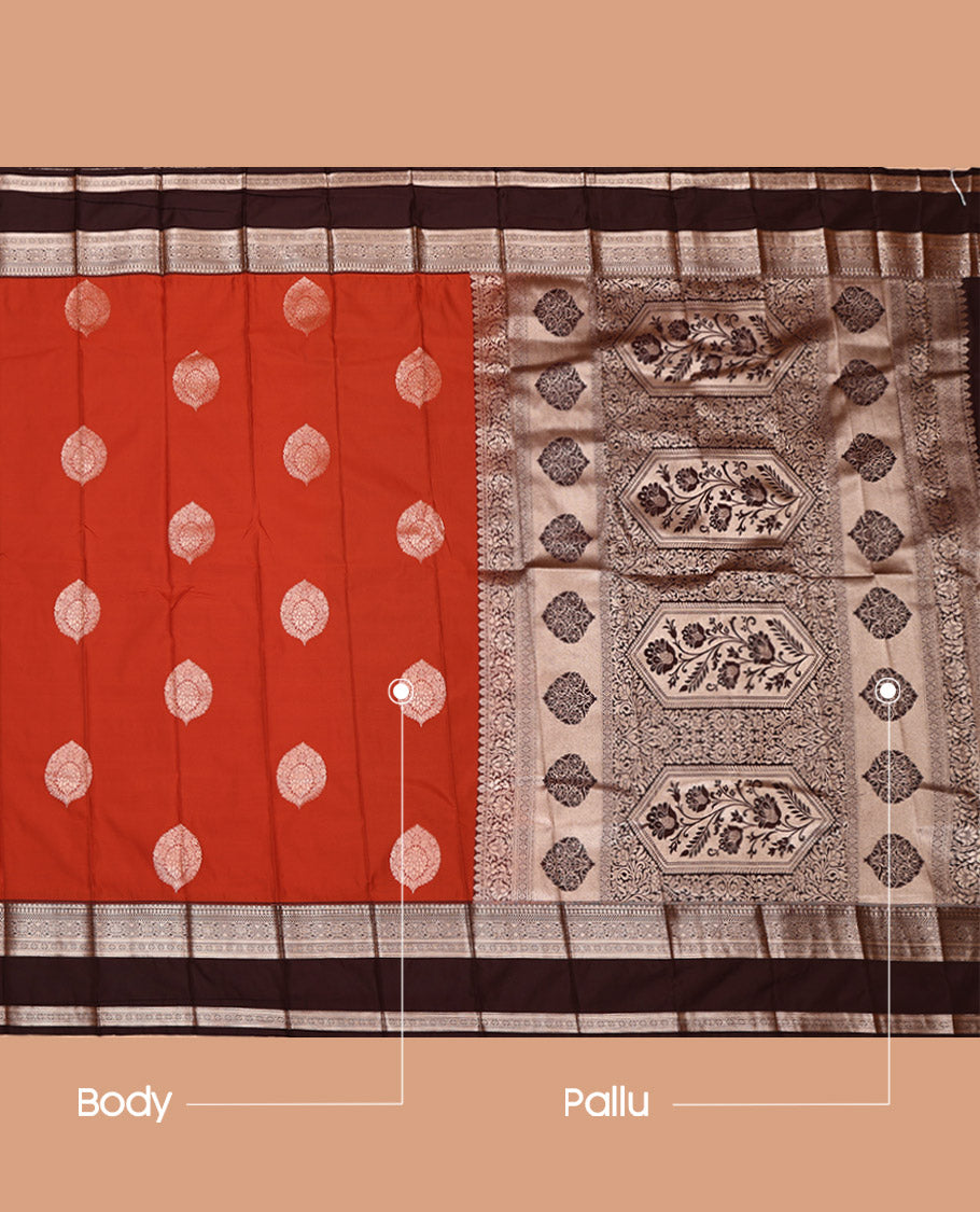 Rust Budget Silk Saree, Detailed with Zari Buttas All Over Its Body, Complemented by a Contrast Traditional Zari Design Rettai Pettu Border, Pallu of Mughal-Style Floral Designs, and Paired with a Contrast Blouse