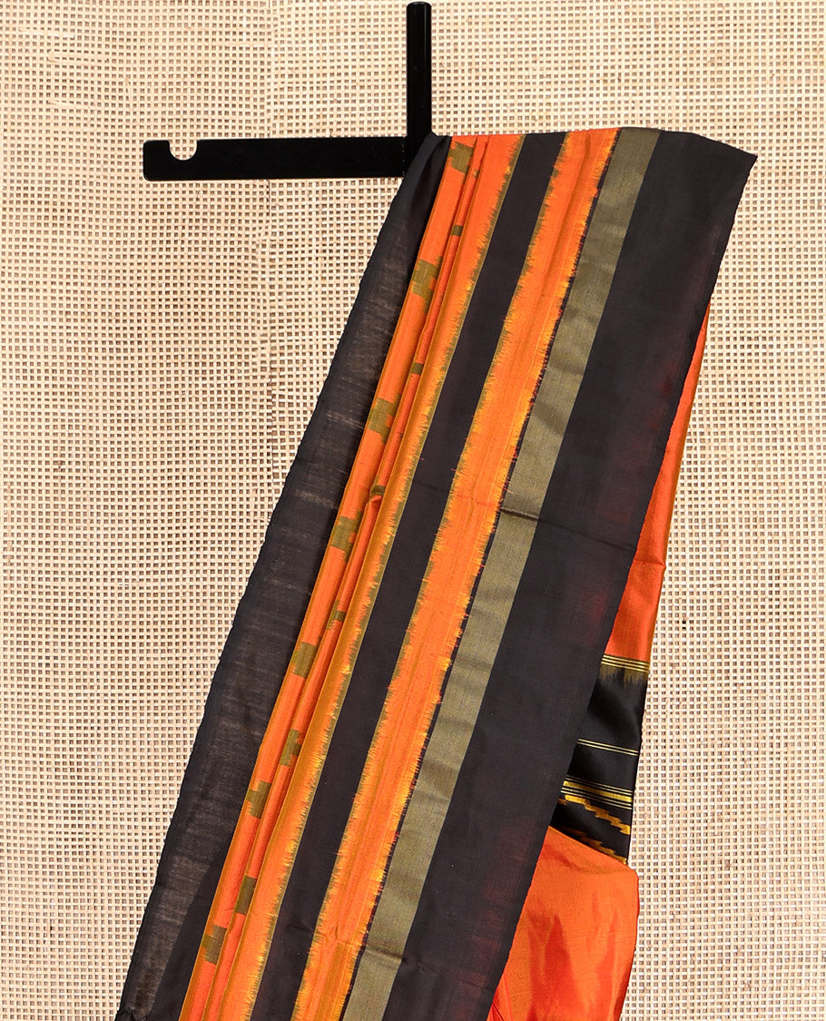 Orange Pochampally Ikat Silk Saree, Decked Up with Chevron Stripes, Complemented by a Contrast Border, Chevron Striped Pallu, and a Contrast Blouse