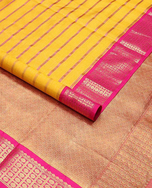 Yellow striped kancheepuram silk saree with contrast border of thilakam mokku, banaras, paun design & zari design pallu