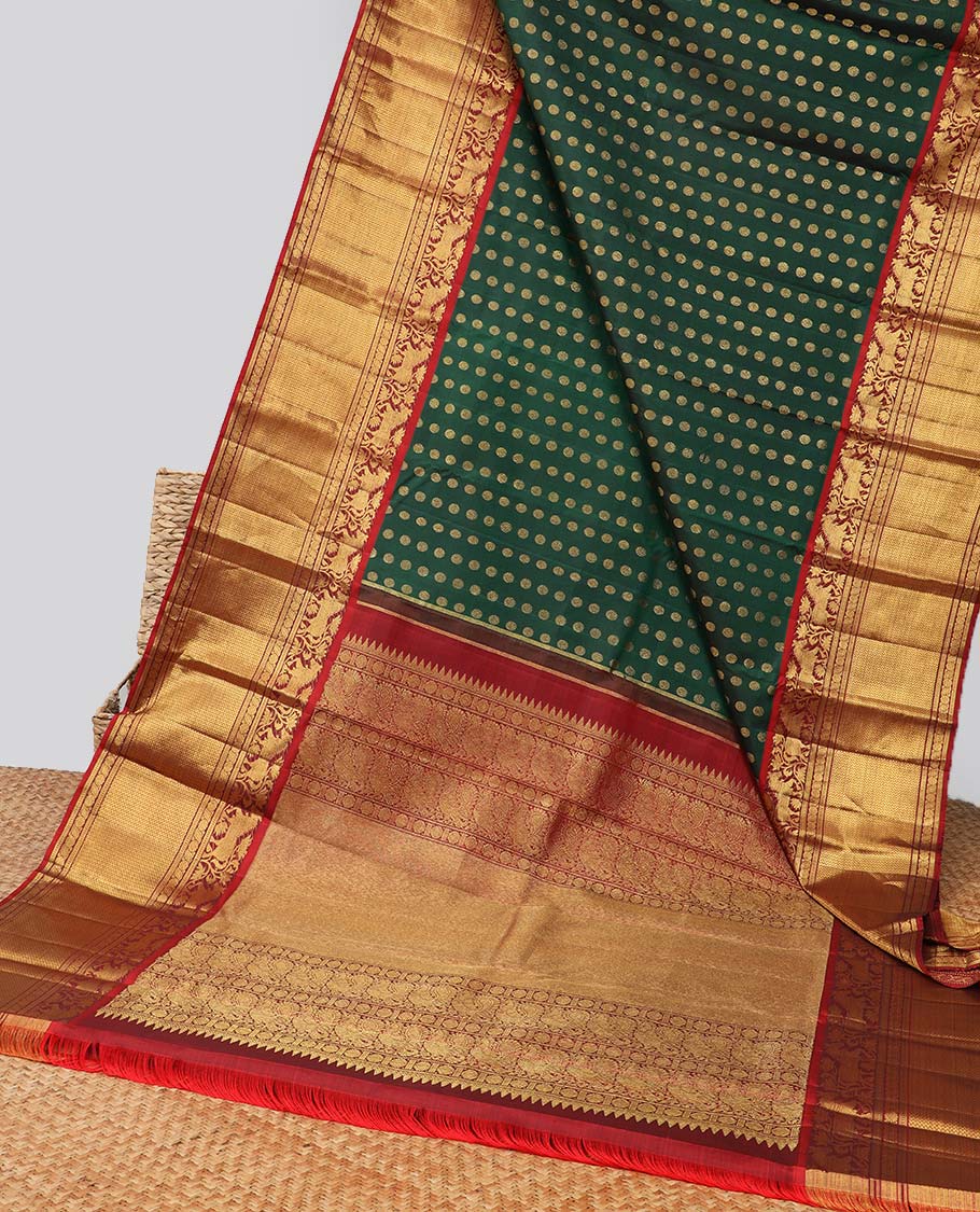 Green zari buttas Kanchipuram silk saree, contrast zari border of kuthirai design & pallu of rekku,poun,mayil & zari design