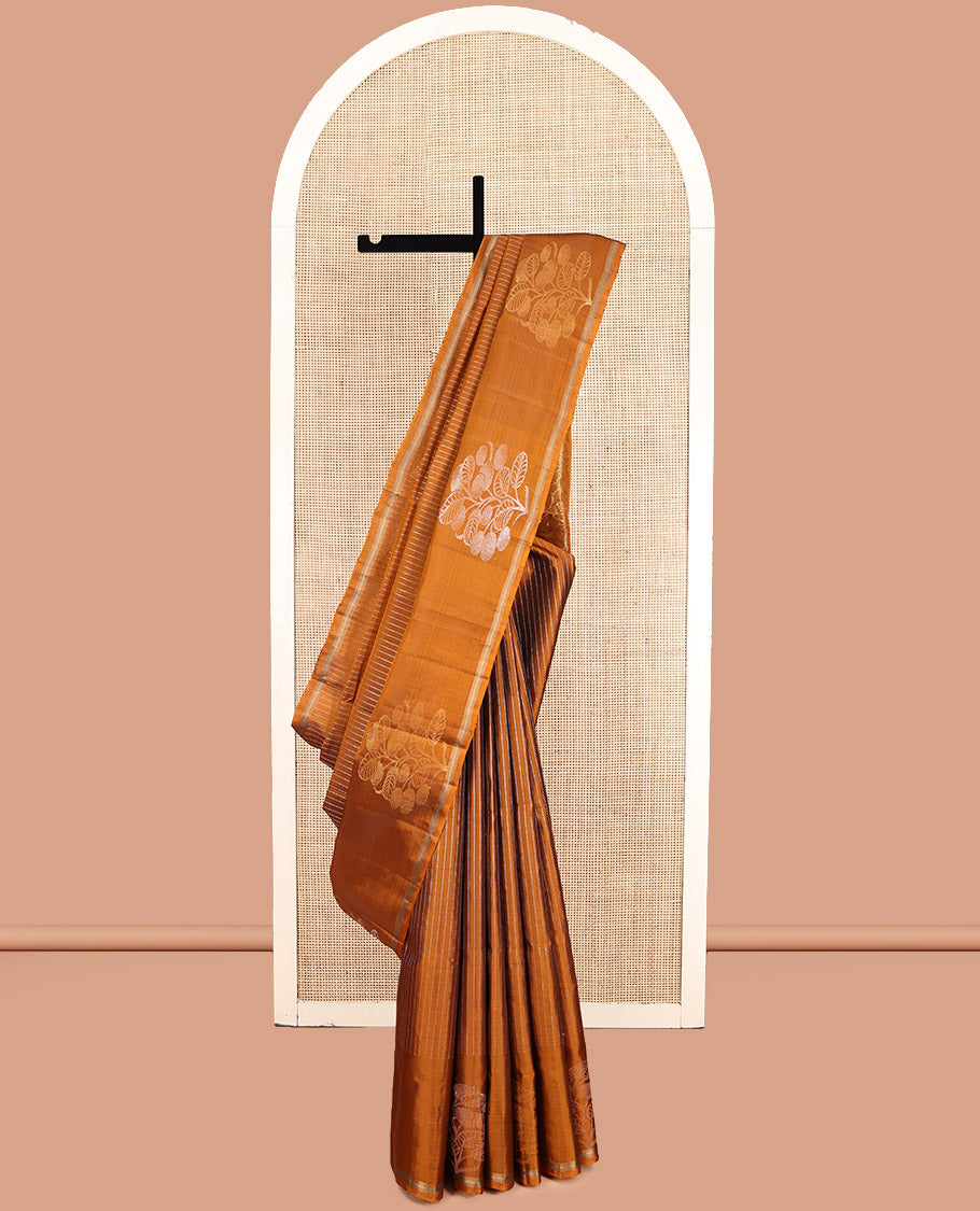 Orange Mayuri Lite Silk Mix Saree, Adorned with Zari Stripes and Floral Buttas, a Zari Piping Border, Pallu of Leaf Vine and a Matching Blouse