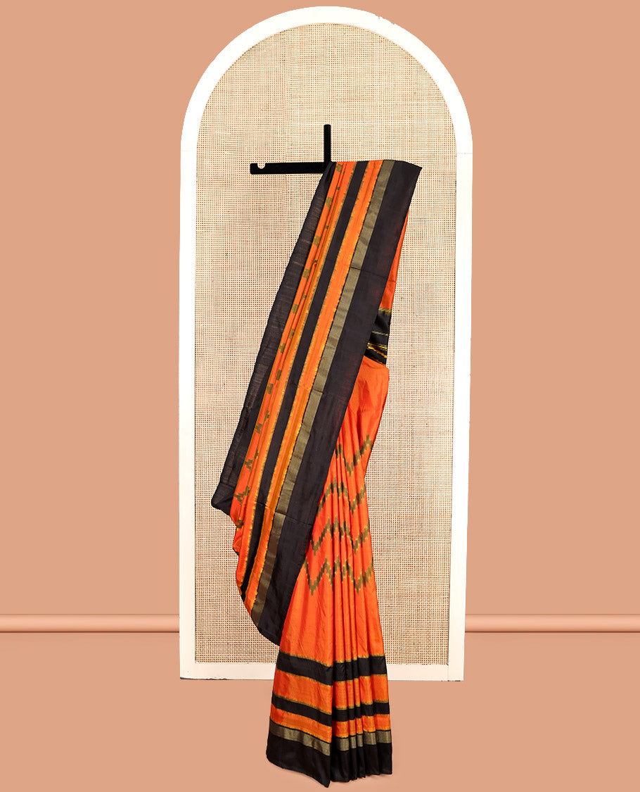 Orange Pochampally Ikat Silk Saree, Decked Up with Chevron Stripes, Complemented by a Contrast Border, Chevron Striped Pallu, and a Contrast Blouse