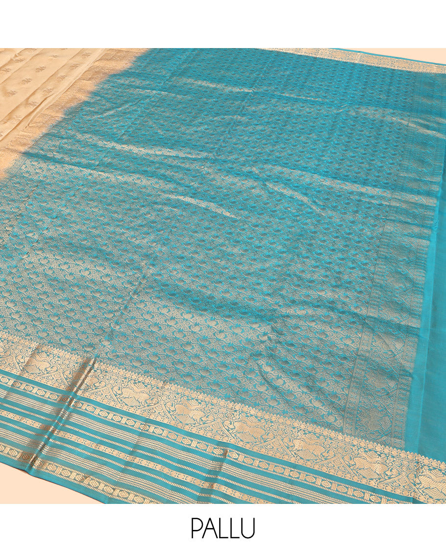 Gold Vasundhara Lite Silk Mix Saree, Bedecked with Iruthalai Pakshi Zari Buttas, Complemented by a Contrast Border of Rekku, Iruthalai Pakshi, Muthu, Laddu Kamalam, and Rudraksham, Opulently Embellished Pallu, and Paired with a Contrast Blouse