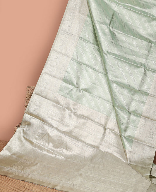 Green striped floral design kancheepuram tissue silk saree with self traditional zari border & intricate zari pallu