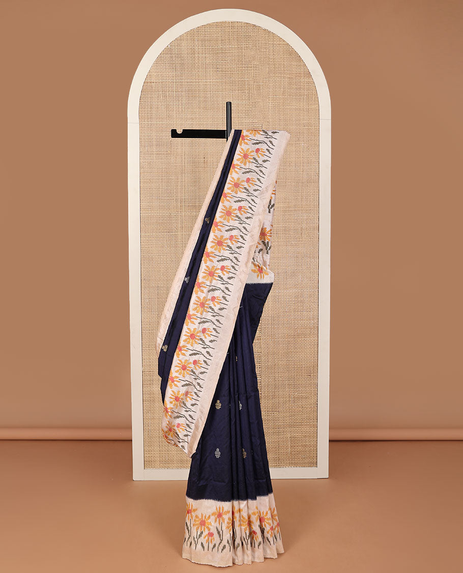 Blue zari buttas pure ikkat saree, contrast border & pallu of floral designs in ikkat-style