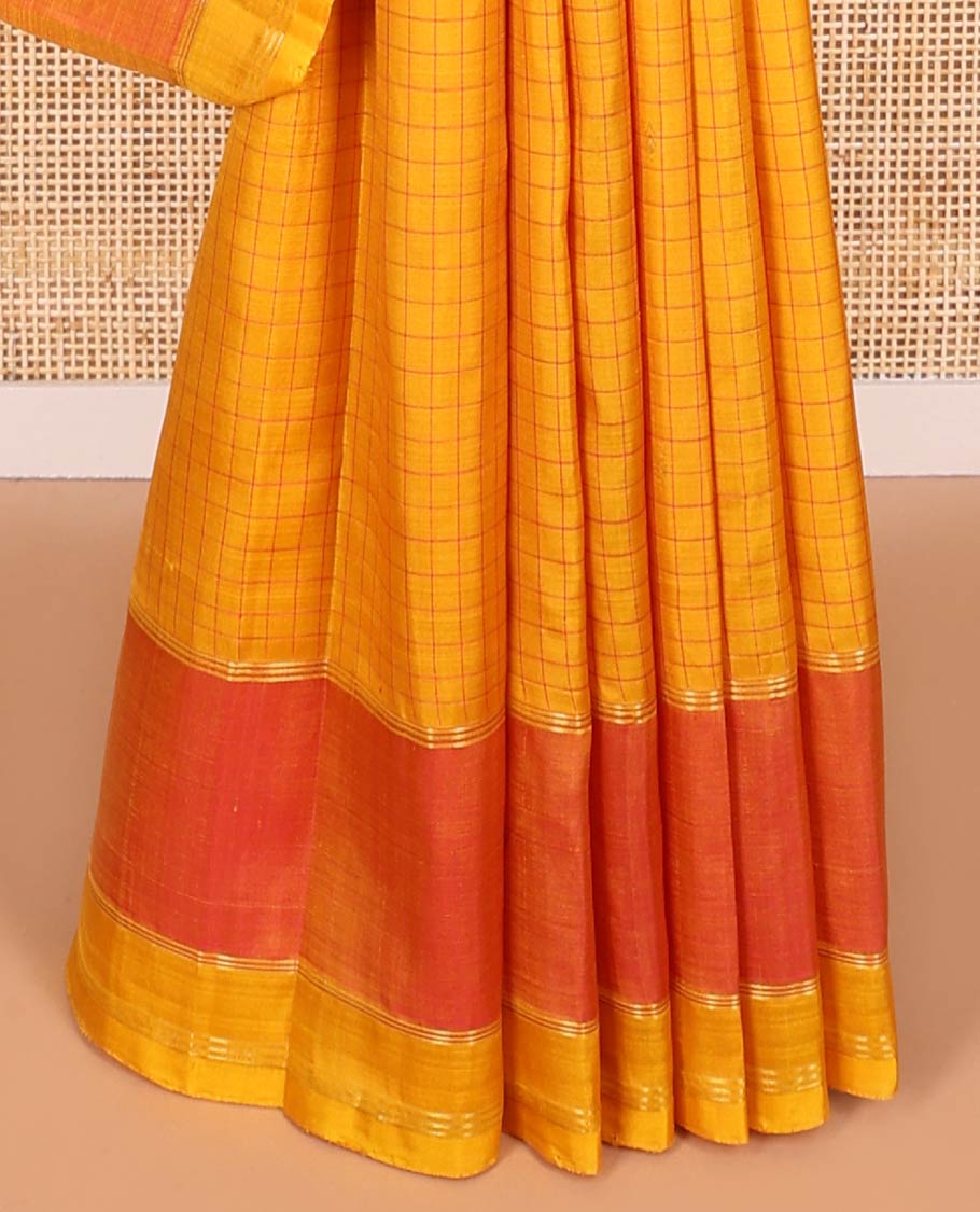 Orange checked, buttas kancheepuram silk saree with contrast floral zari design border & floral design pallu