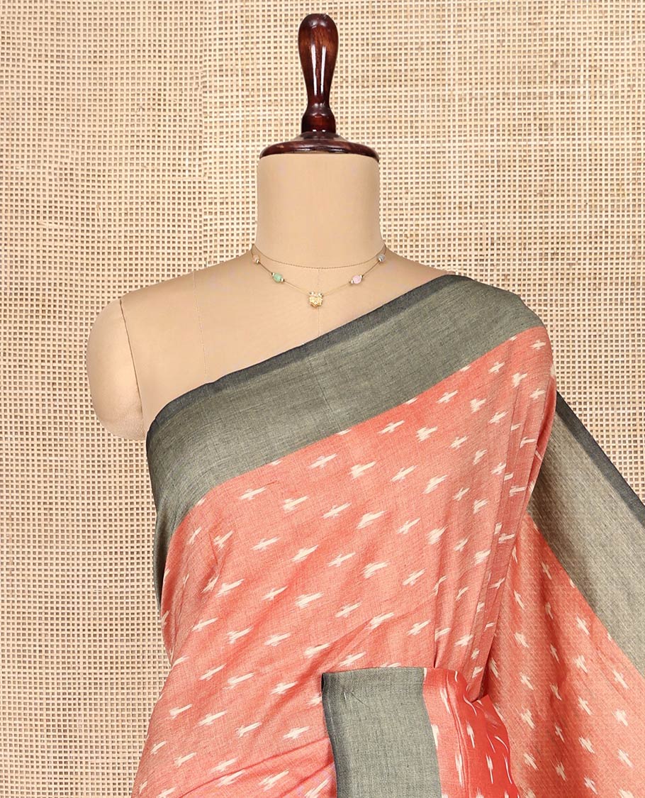 Orange Ikkat Cotton Saree, Embellished with Buttas on Its Body, Complemented by a Contrast Border, Pallu of Ikkat-Style Buttas, and Has No Blouse