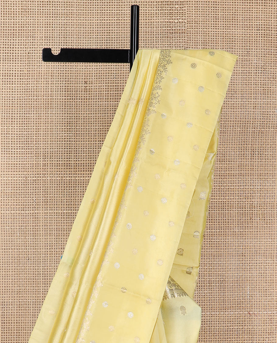 Lemon yellow floral motifs raw mango silk saree with self zari design & floral design pallu