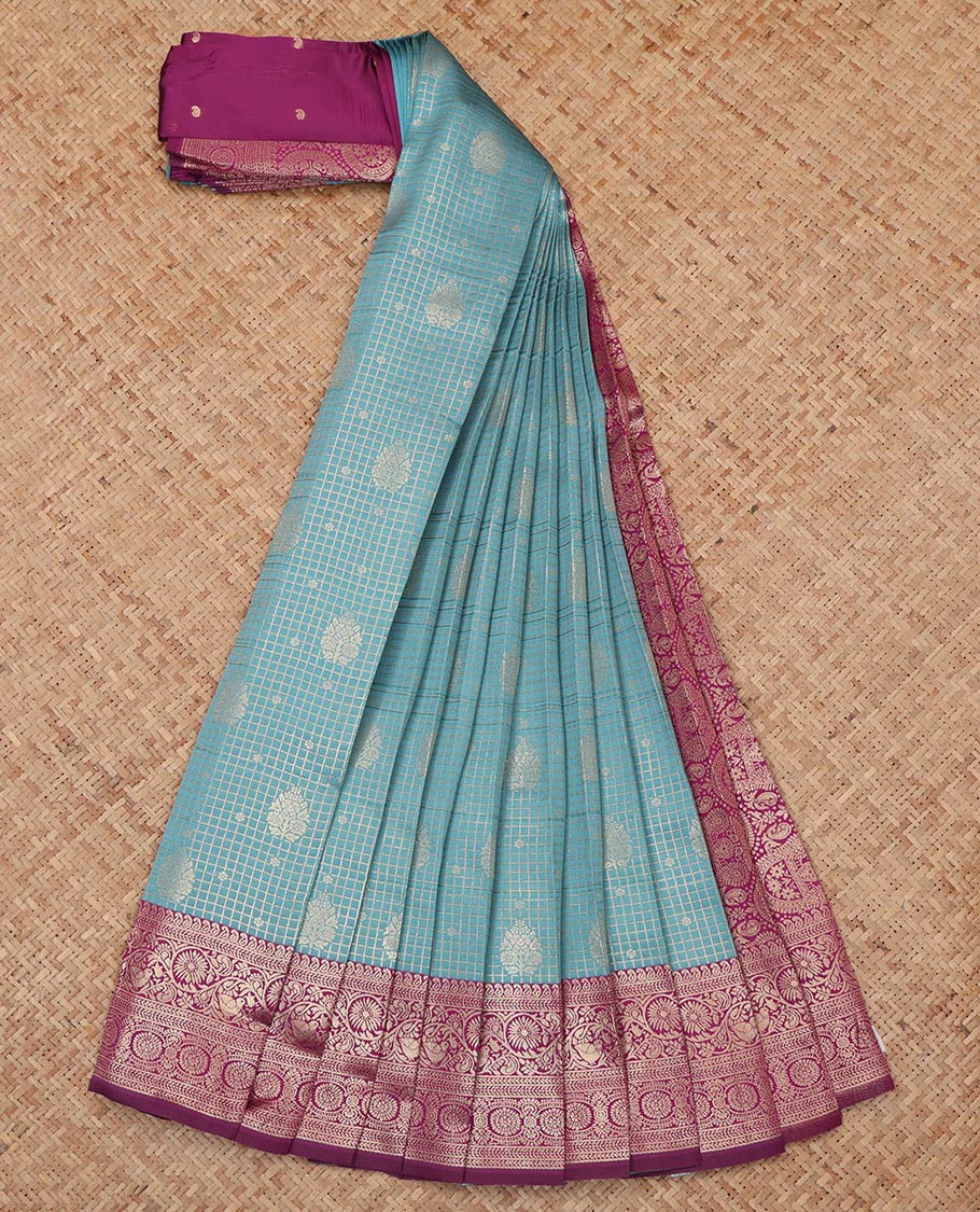 Blue Litchi Saree, Bedecked with Zari Buttas and Checks, a Contrast Traditional Zari Border, Grand Pallu, and a Contrast Blouse