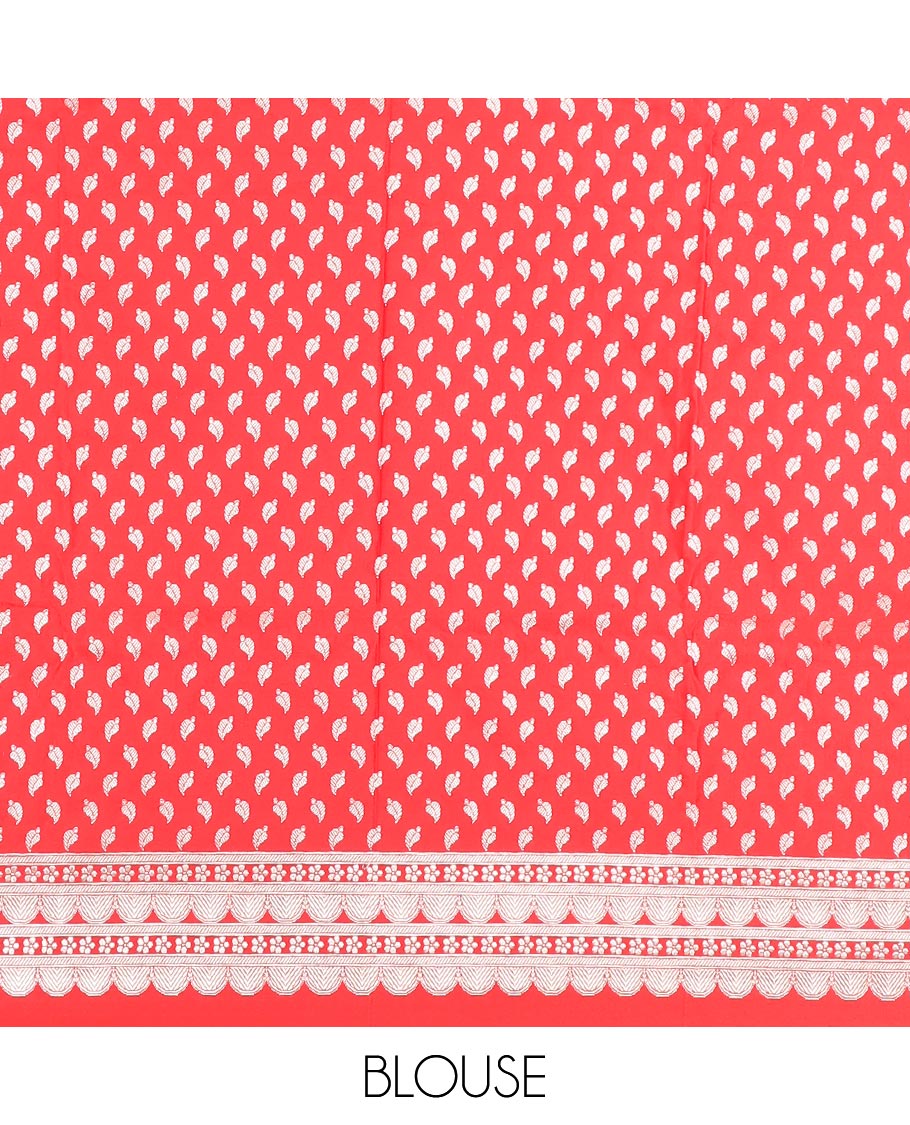 Red plain mushru silk saree, self-border of scallop design, floral, and tree motifs, and intricately designed pallu