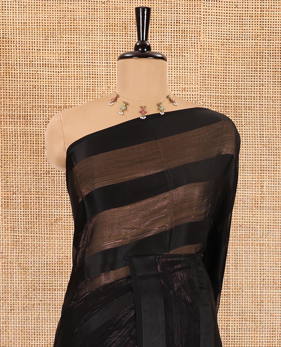 Borderless black horizontal satin thick striped shimmer georgette saree with a contrast blouse
