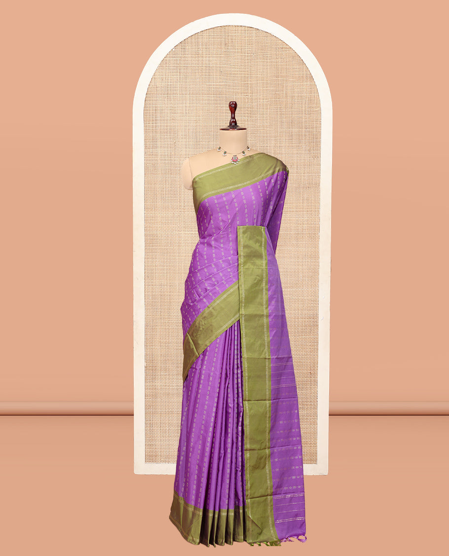 Violet Arani Saree Features Zari Buttas, a Contrast Rettai Pettu Border, Pallu of Zari Designs, and a Matching Blouse