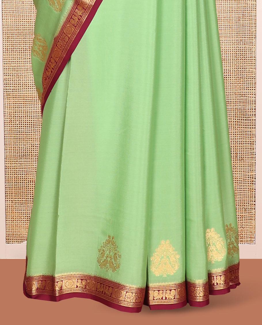 Green Mysore Silk Saree Prettified with Zari Buttas All Over Its Body, Complemented by Captivating Contrast Border of Traditional Zari Designs, Zari Designs Woven Pallu, and Paired with a Contrast Blouse