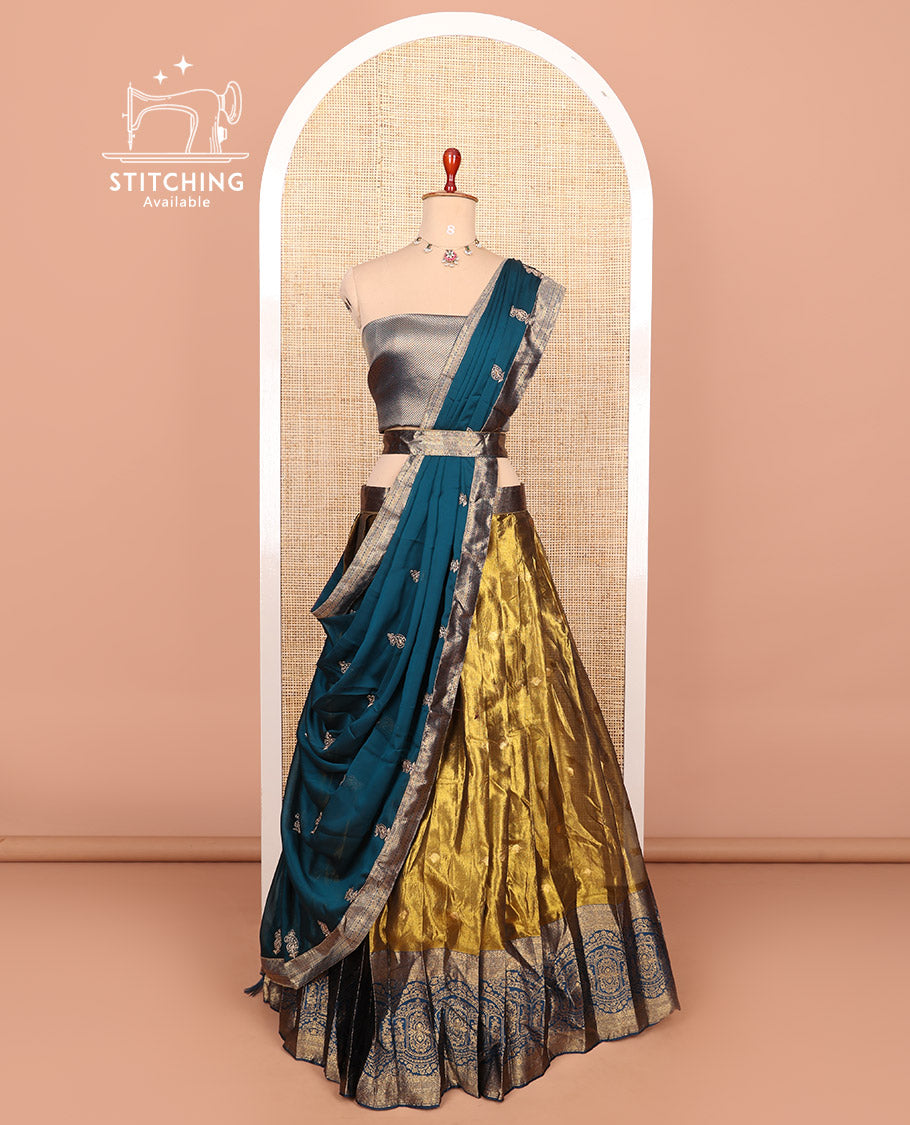 Gold-peacock blue zari buttas half-saree with contrast intricate Mughal motifs woven bordered skirt, brocade blouse, and a zari design dhavani