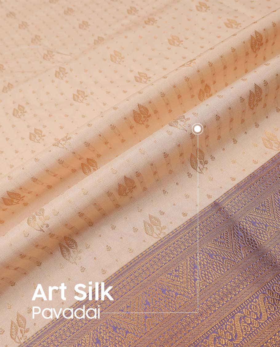 Cream art silk pavadai material, zari buttas with contrast traditional zari bordered skirt, and a contrast bordered blouse
