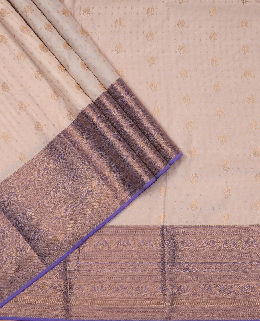 Cream art silk pavadai material, zari buttas with contrast traditional zari bordered skirt, and a contrast bordered blouse