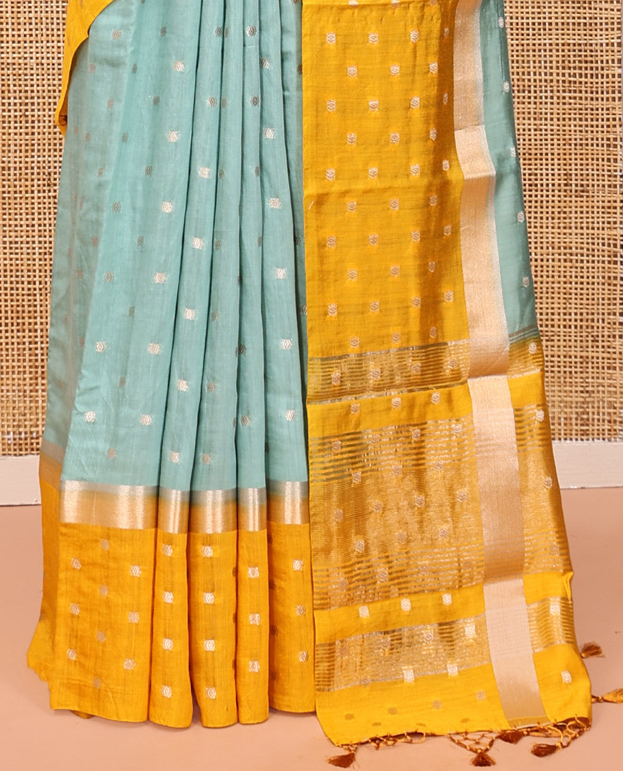 Pale Blue Assam Silk Saree, Steeped with Zari Buttas, Complemented by Contrast Zari Buttas Woven Border, Gleaming Pallu, and Contrast Blouse