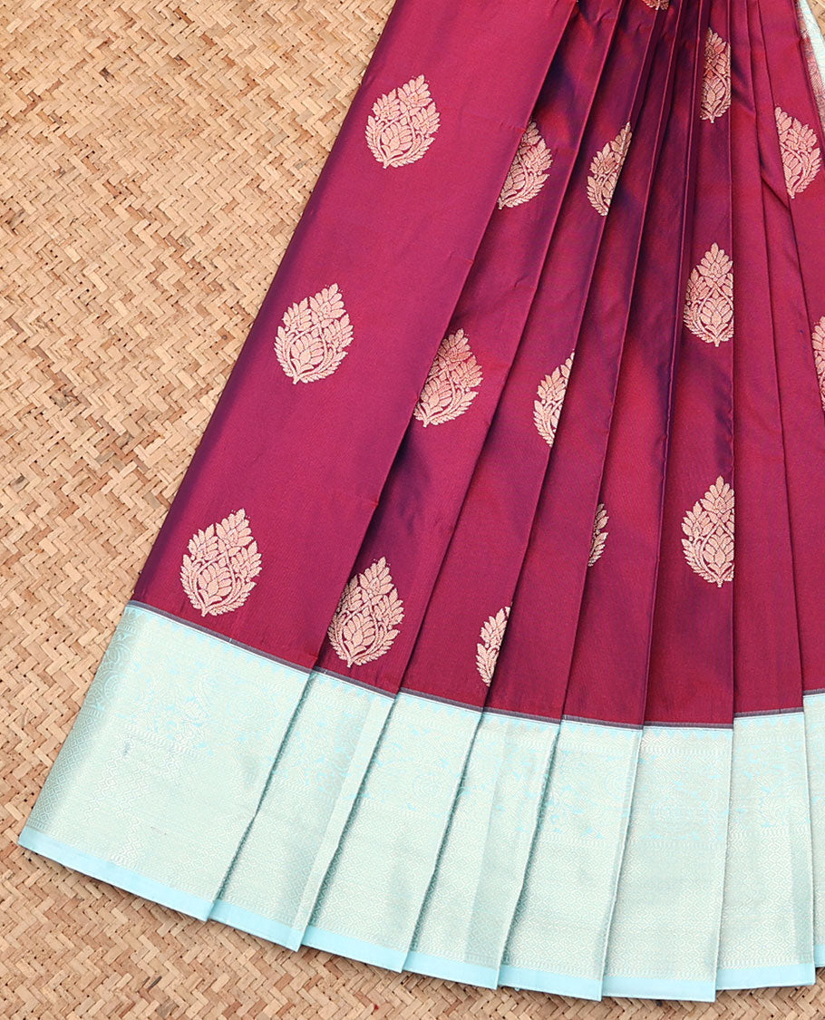 Wine Budget Silk Saree, Decked Up with Zari Buttas All Over Its Body, Complemented by a Contrast Traditional Zari Design Border, Sparsely Woven Jaal Pallu, and Paired with a Contrast Blouse