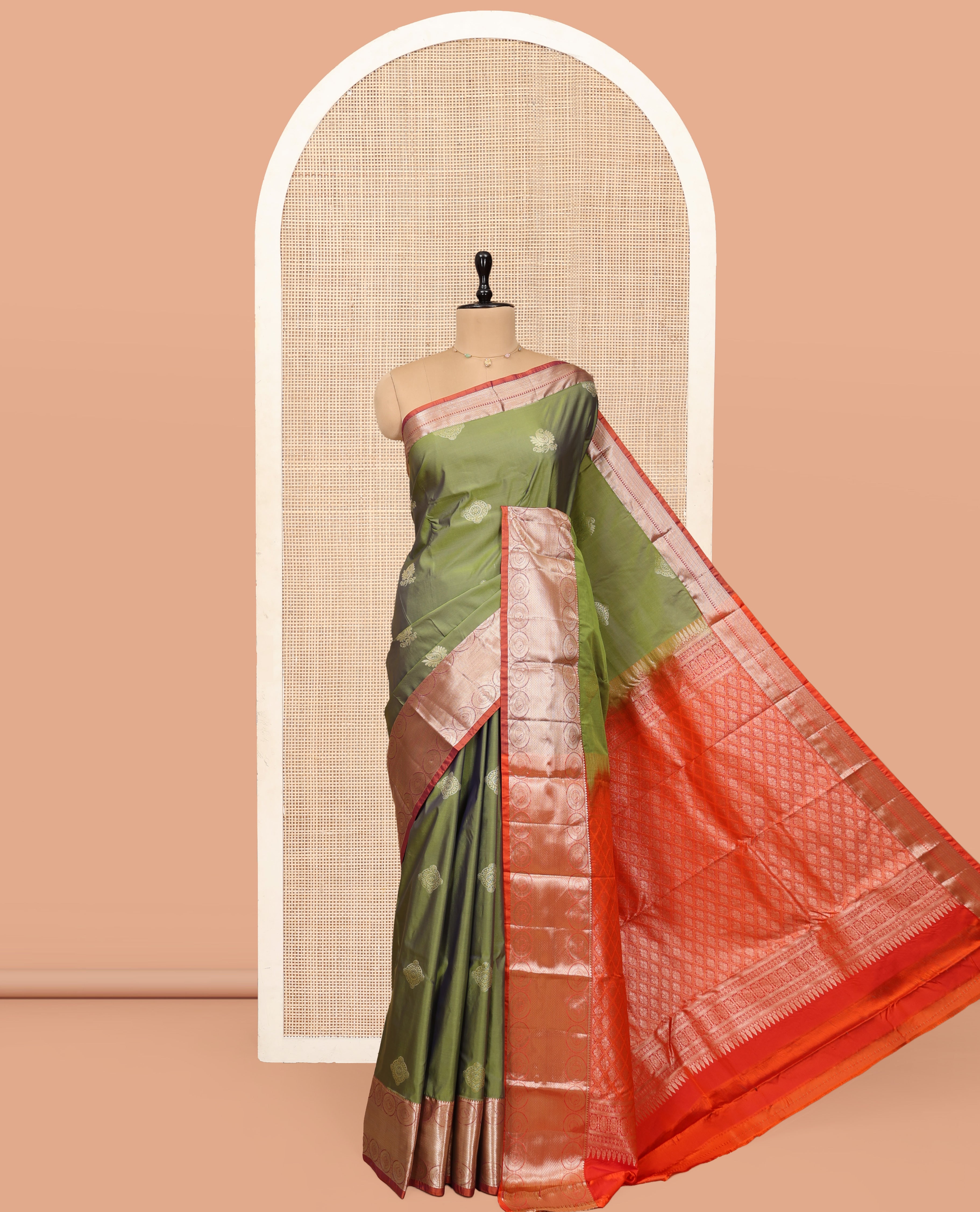 Green Budget Silk Saree, Bedecked with Zari Buttas, Complemented by a Contrast Traditional Chakram Zari Border, Jaal Pallu, and Contrast Blouse