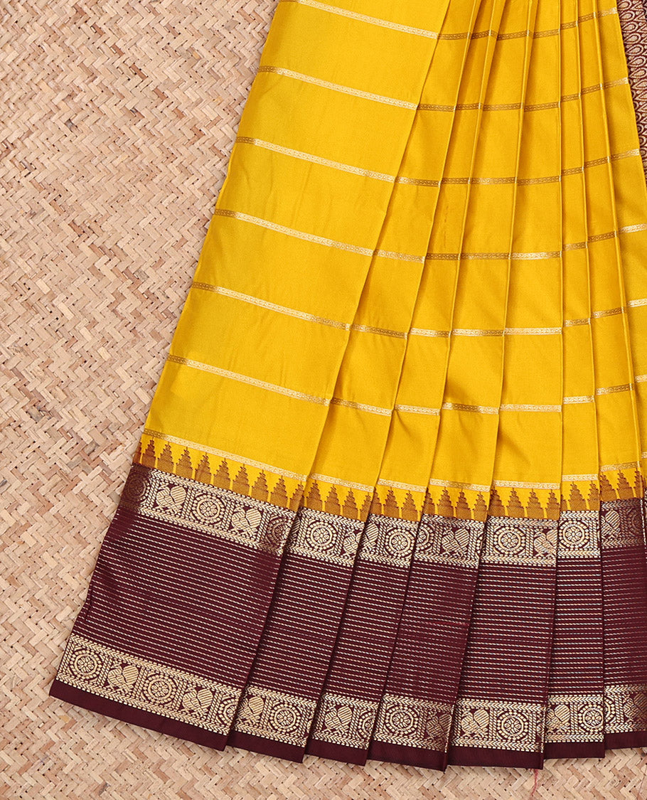 Yellow Budget Silk Saree, Sparsely Threaded with Zari Stripes, Complemented by a Contrast Traditional Zari Temple Border, Grand Pallu, and a Contrast Blouse