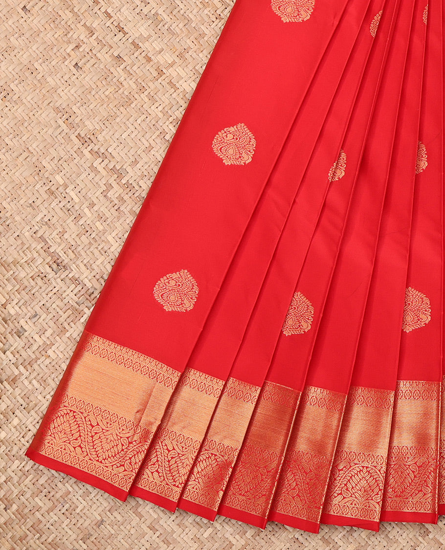 Red Budget Silk Saree, Spotlighted with Zari Buttas, Highlighted by a Traditional Zari Border, Intricate Pallu, and Matching Blouse