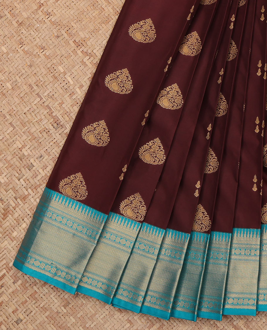 Brown Budget Silk Saree, Ornamented with Zari Buttas, a Contrast Traditional Zari Border, Grand Pallu, and a Contrast Blouse