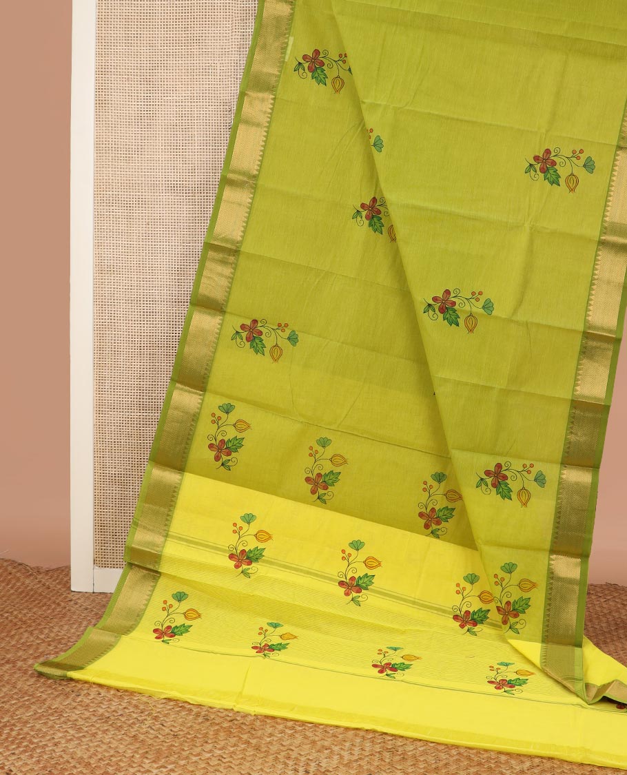 Green base colorful floral motifs printed Chirala cotton saree, traditional border, and pallu of floral buttas