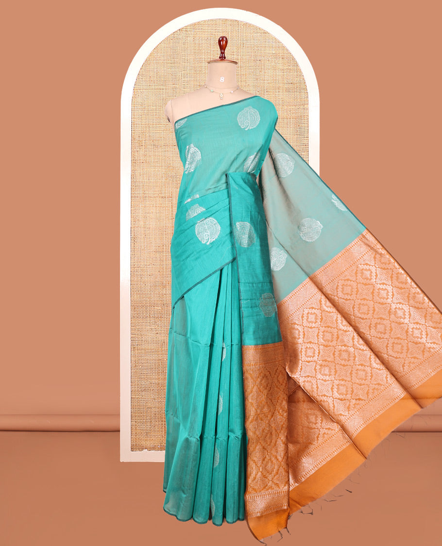 Borderless Green Semi-Silk Cotton Saree, Beautified with Zari Buttas All Over Its Body, Complemented by Contrast Jaal Patterned Pallu, and Paired with a Contrast Blouse