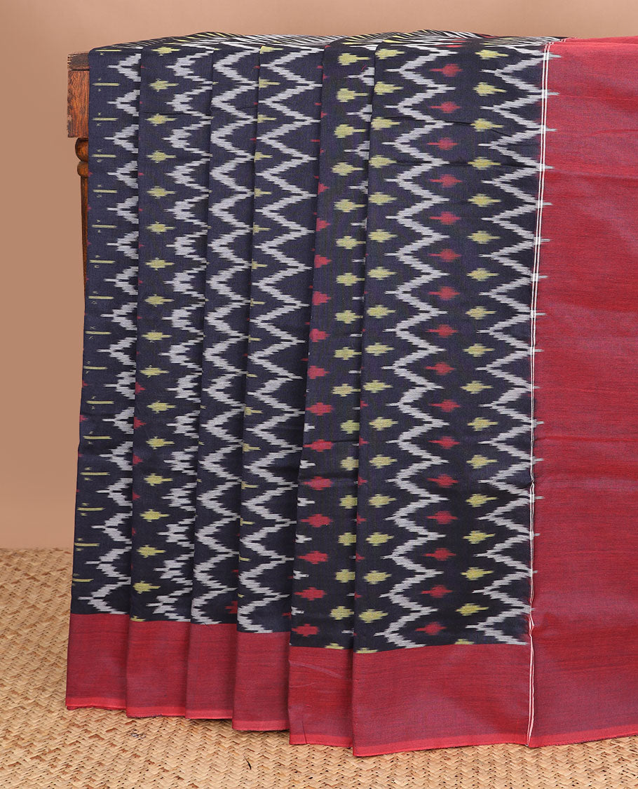 Navy blue chevron-patterned ikkat cotton saree, contrast plain border & pallu of ikkat design