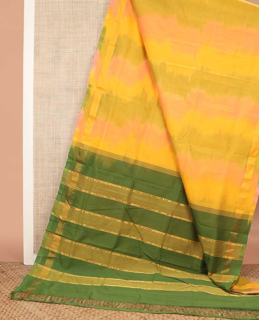 Yellow ikkat poly cotton saree, zari border, and contrast striped pallu