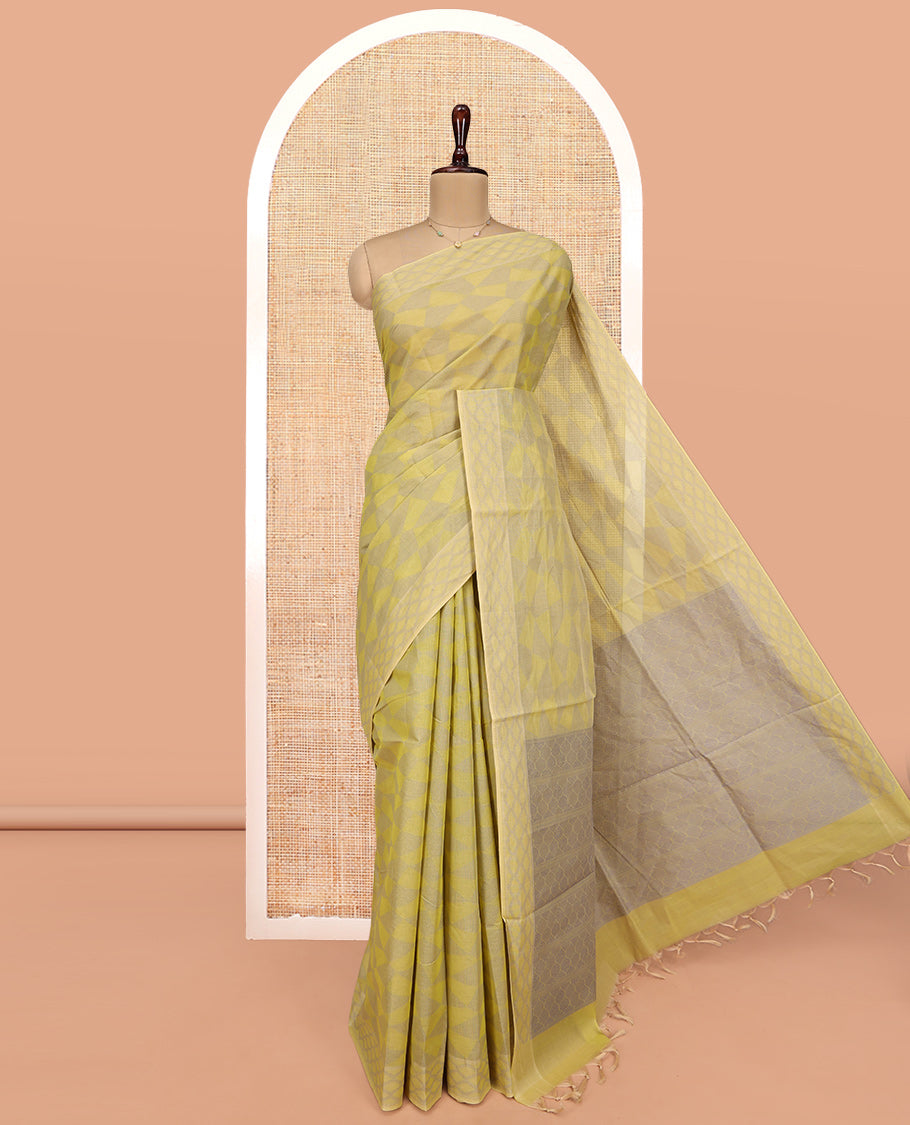 Pale Green Coimbatore Cotton Saree, Subtly Sparkled with Geometric Design on Its Body, a Subtle Diamond Border, Pallu of Ogee Patterns, and Paired with Matching Blouse