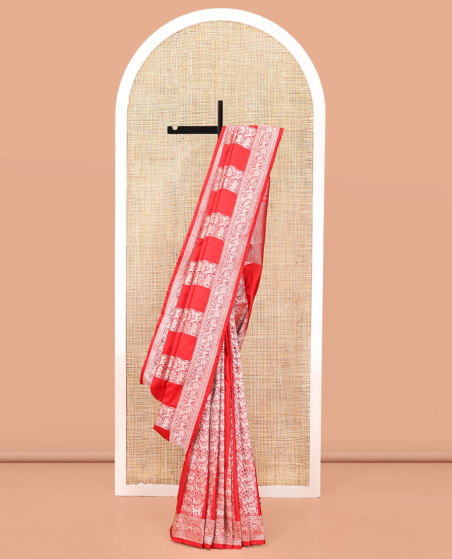Red Mushuru Silk Saree, Gracefully Embellished with Vertically Woven Flora-Fauna Zari Designs On Its Body, Highlighted by Zari Border of Peacock and Deer Motifs, Grand Pallu, and Paired with a Plain Blouse