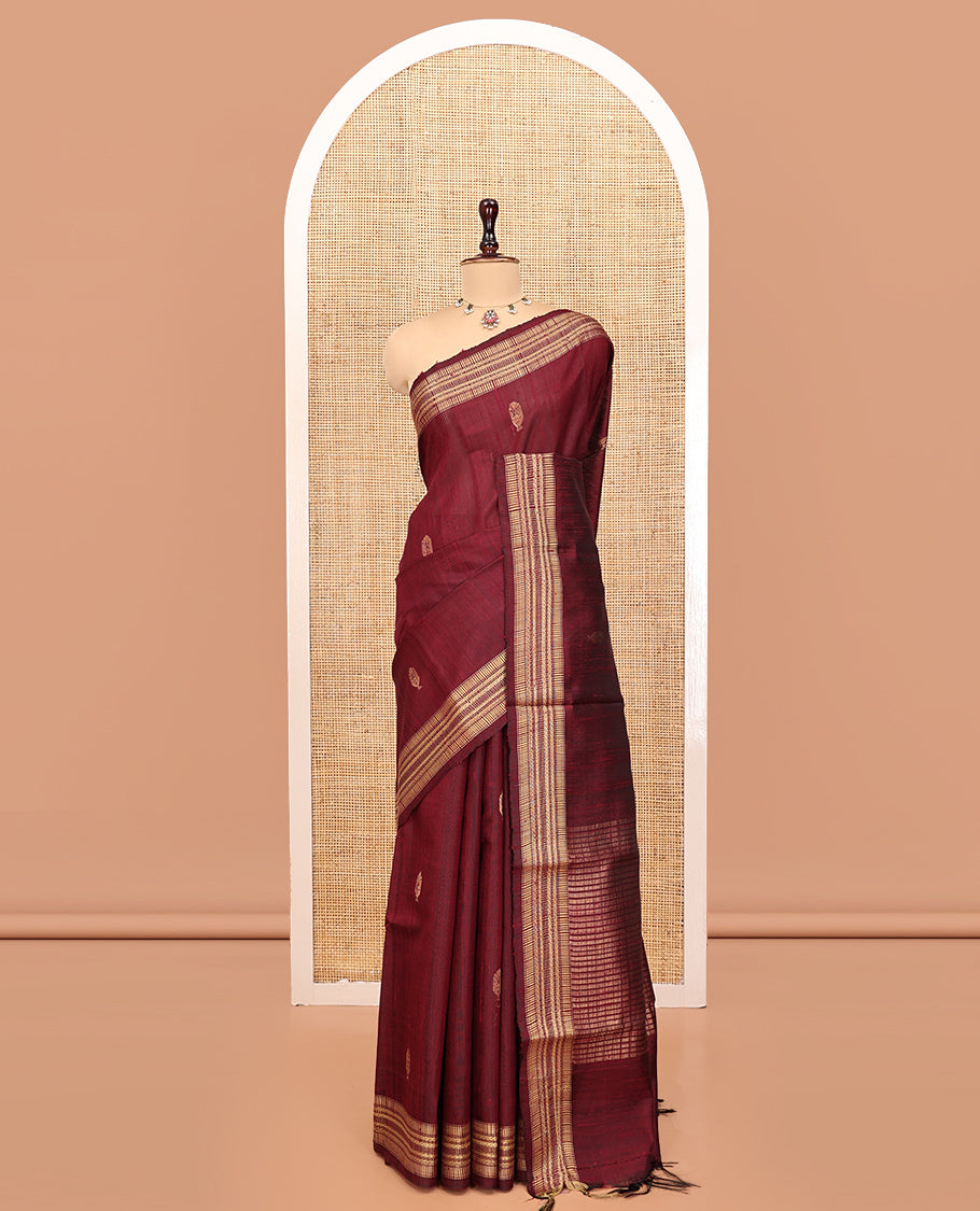 Maroon Dupion Silk Saree, Ornamented with Buttas, a Traditional Border, Striped Pallu, and a Matching Blouse