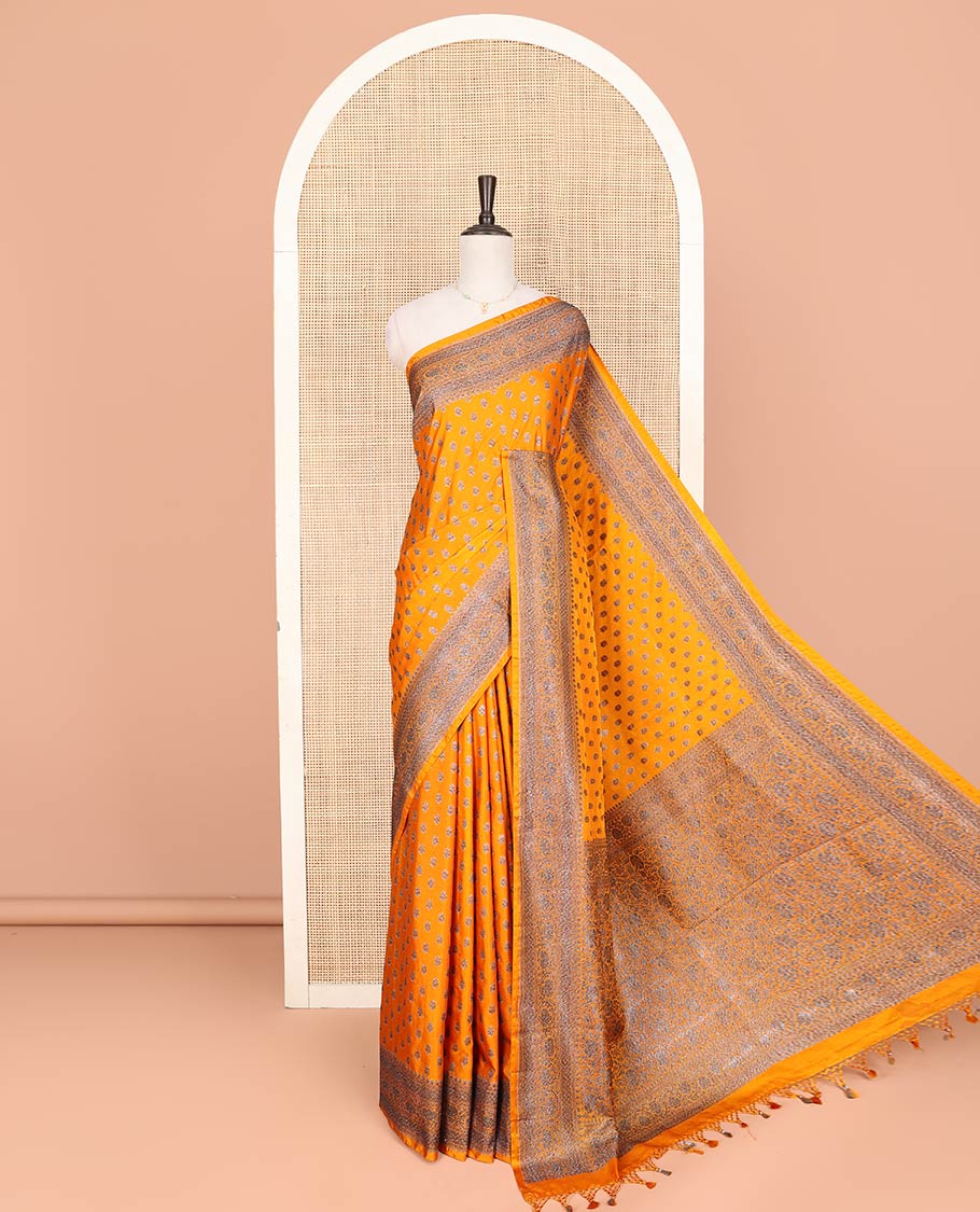 Orange Fancy Georgette Saree Bedecked with Zari Buttas, Hazily Zari Woven Border of Traditional Designs, Hazily Woven Pallu of Floral Jaal Designs, and Paired with a Matching Blouse