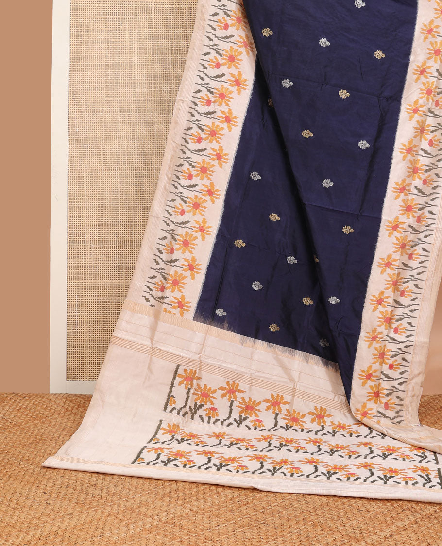 Blue zari buttas pure ikkat saree, contrast border & pallu of floral designs in ikkat-style