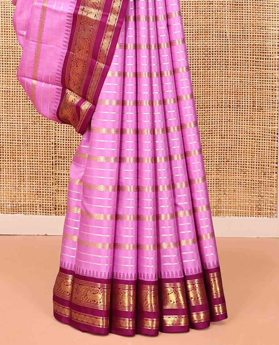 Pink Kanchipuram Designer Silk Saree, Majestically Detailed with Zari Stripes, Contrast Temple Border of Muthu, Banaras, Yaali, Mayil, and Jada Nagam, Geometric Pallu, and a Contrast Blouse