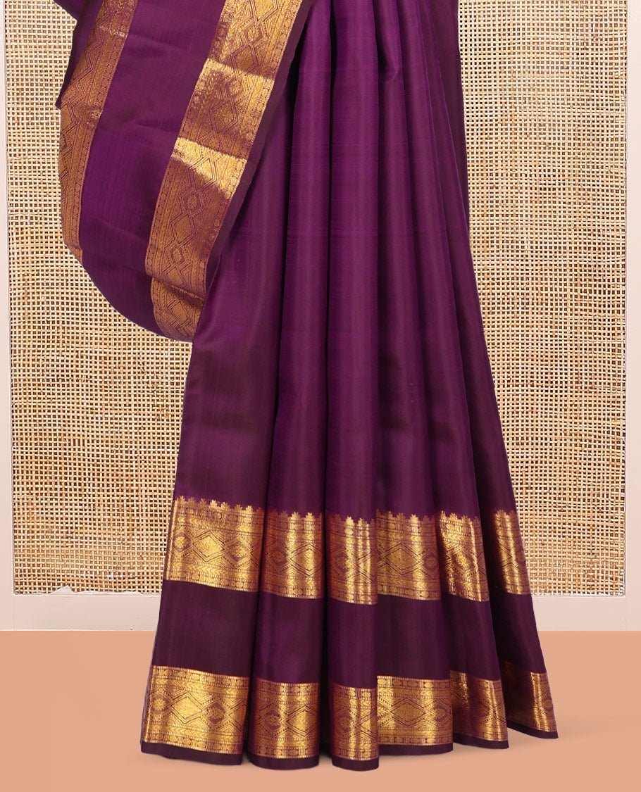 Purple Kanchipuram Silk Saree, Accentuated with Zari Buttas, Highlighted by Zari Rettai Pettu Border of Thazampoo Rekku, Muthu, Poun, and Diamond Designs, Manga Pallu, and Matching Blouse